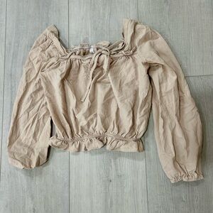 Cream off the shoulder blouse with tie detail